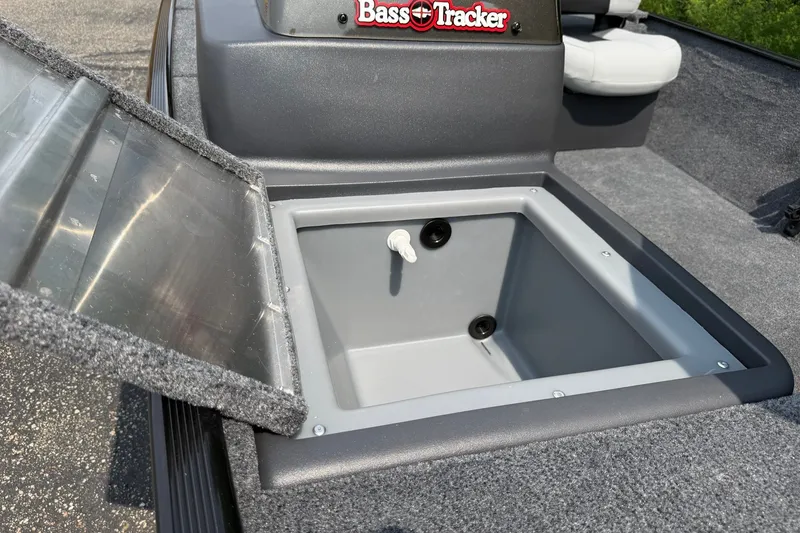 Slide: The Image of Open storage compartment on 2027 Tracker Bass Tracker Classic XL boat. - 19