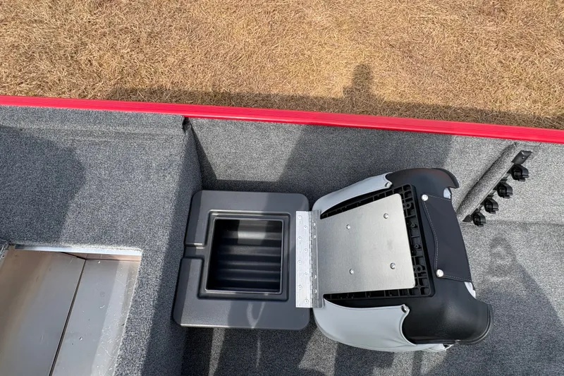 Slide: The Image of 2027 Tracker Bass Tracker Classic XL boat interior with seat and storage compartment. - 87