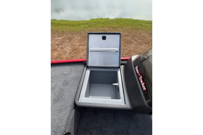Slide: The Image of Open storage compartment on 2027 Tracker Bass Tracker Classic XL boat. - 84