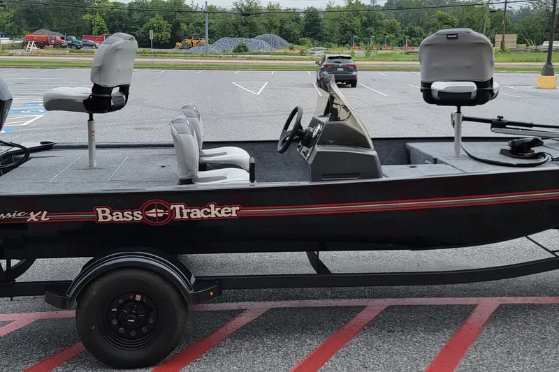 The Image of 2027 Tracker Bass Tracker Classic XL boat in parking lot, side view. - 0