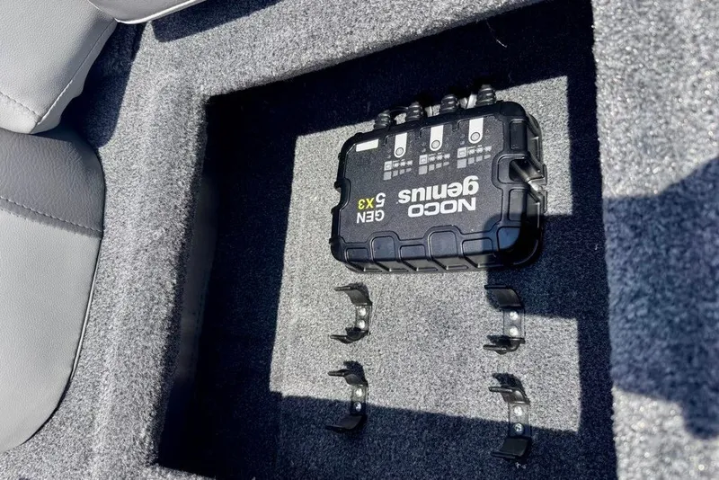 Slide: The Image of NOCO Genius GEN5X3 charger installed in 2027 Tracker Pro Team 175 boat compartment. - 19