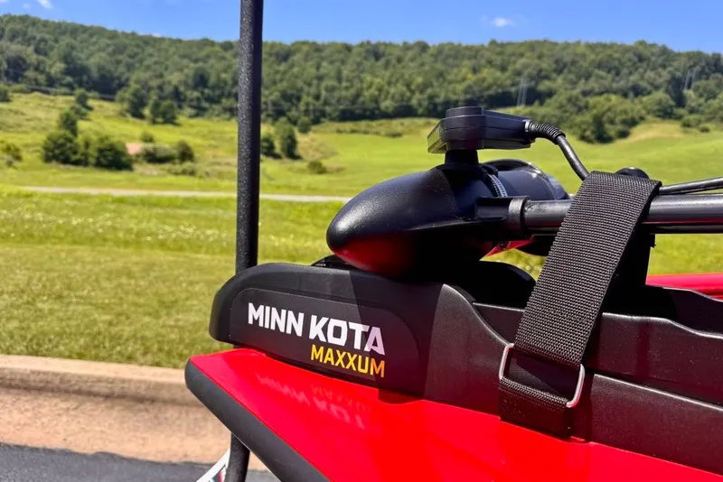 Slide: The Image of Minn Kota Maxxum motor on 2027 Tracker Pro Team 175 boat, scenic background. - 20