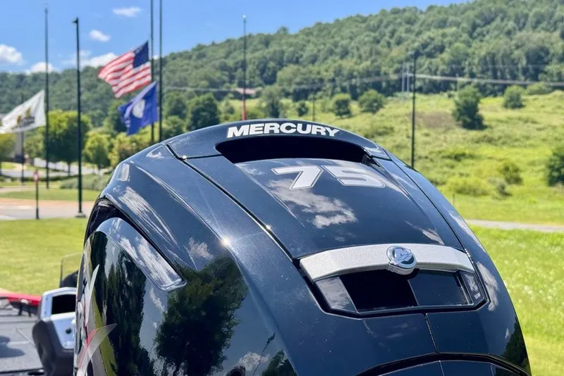 Slide: The Image of Mercury 75 outboard motor on Tracker Pro Team 175, 2027 model, with scenic background. - 22