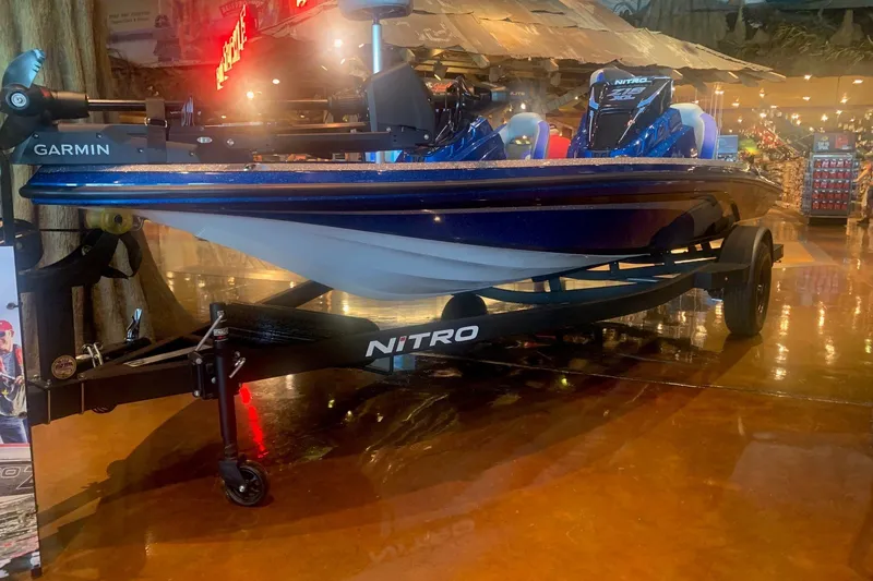 The Image of 2027 Nitro Z18 XL Pro boat with Garmin equipment on display indoors. - 0