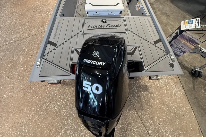 Slide: The Image of 2027 Tracker Bass Tracker Classic CC with Mercury 50 engine, featuring "Fish the Finest!" deck design. - 43