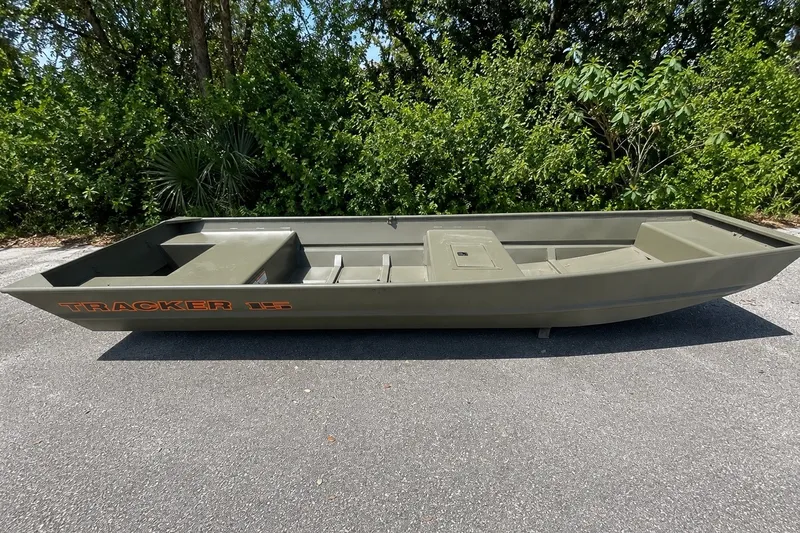 The Image of 2027 Tracker Grizzly 15 Jon boat in a natural outdoor setting. - 0