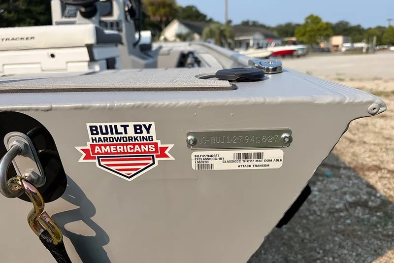 Slide: The Image of 2027 Tracker Bass Tracker Classic CC boat with "Built by Hardworking Americans" sticker. - 15