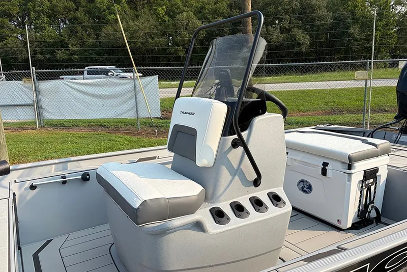Slide: The Image of 2027 Tracker Bass Tracker Classic CC boat interior with seating and storage. - 16