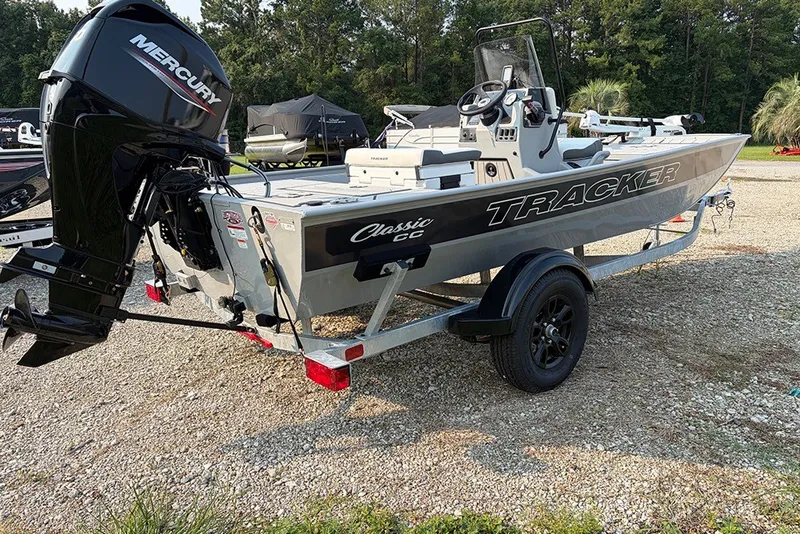 Slide: The Image of 2027 Tracker Bass Tracker Classic CC boat with Mercury engine on a trailer. - 14