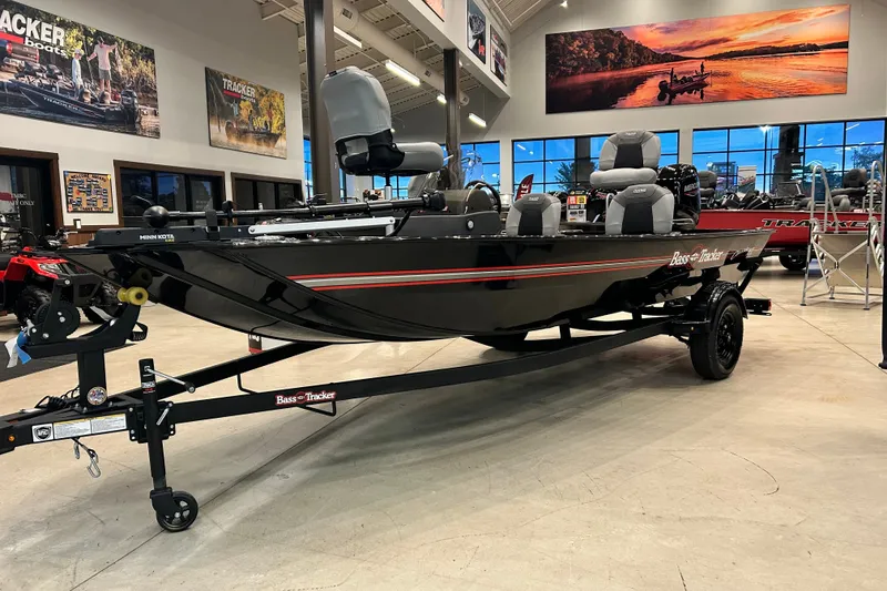 The Image of 2027 Tracker Bass Tracker Classic XL boat displayed in a showroom. - 0