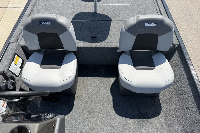 Slide: The Image of 2027 Tracker Bass Tracker Classic XL boat seats, gray and black upholstery, interior view. - 14