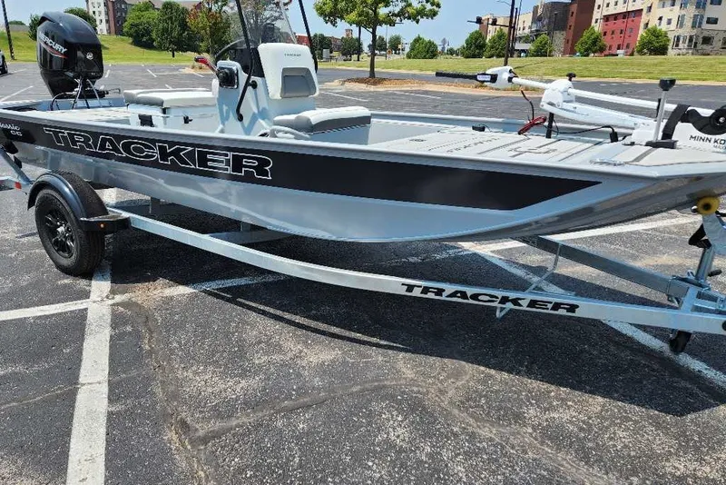 The Image of 2027 Tracker Bass Tracker Classic CC boat on trailer in parking lot. - 0