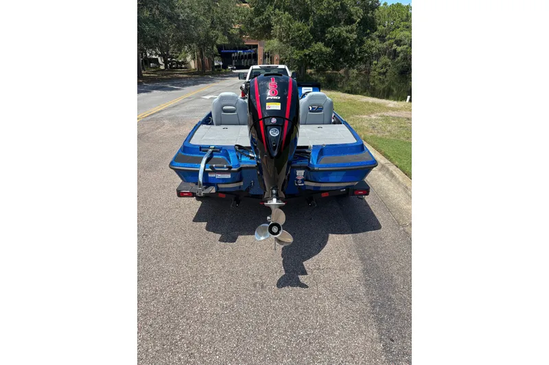 Slide: The Image of 2027 Nitro Z18 XL boat with powerful outboard motor on a trailer. - 8