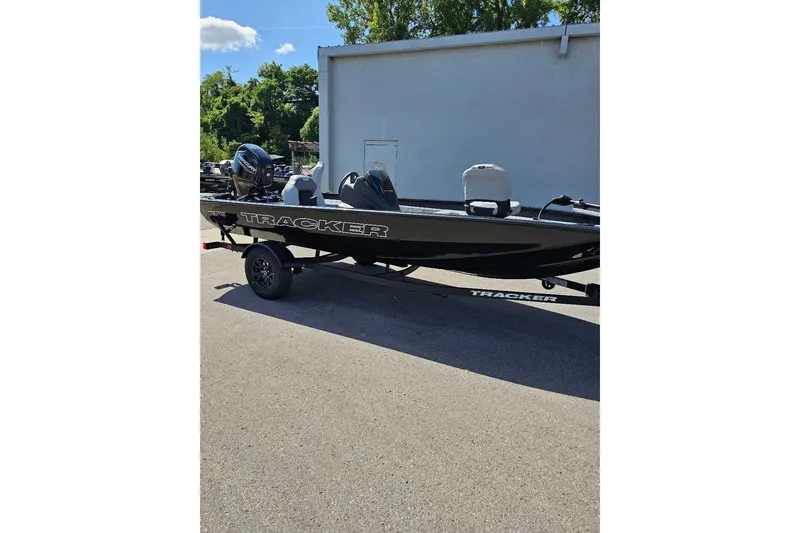 The Image of 2027 Tracker Pro Team 175 boat parked outdoors on a sunny day. - 0