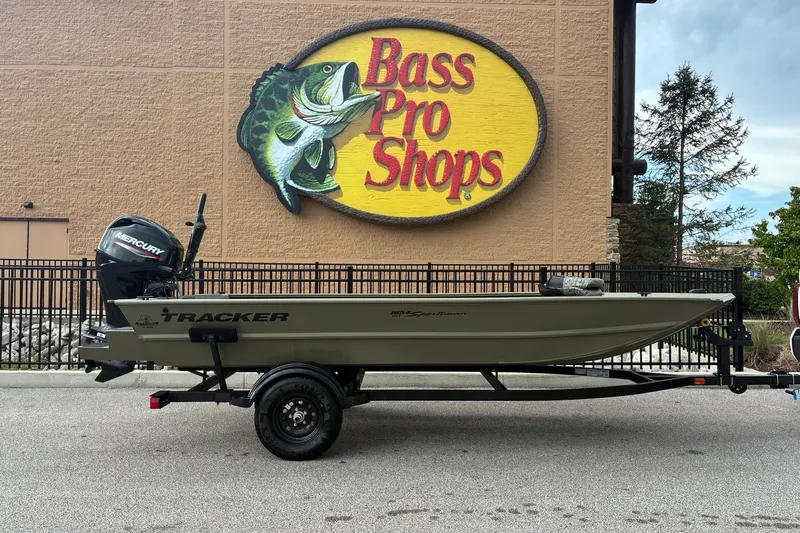 The Image of 2027 Tracker Grizzly 1654 T Sportsman boat outside Bass Pro Shops. - 0