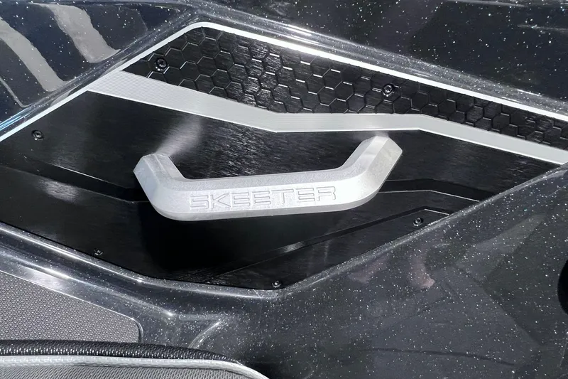 Slide: The Image of 2026 Skeeter FXR20 boat handle with sleek, modern design and hexagonal pattern. - 15