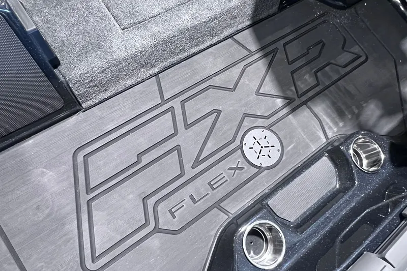 Slide: The Image of 2026 Skeeter FXR20 boat floor with FXR Flex branding and cup holders. - 10