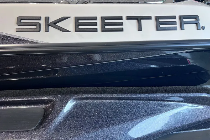 Slide: The Image of 2026 Skeeter FXR20 boat logo on a sleek, metallic surface. - 3