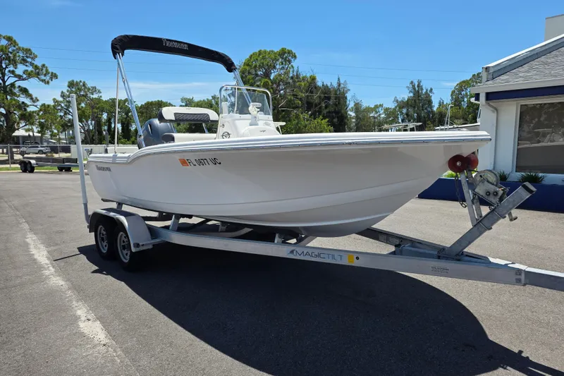 The Image of 2024 Tidewater 180 CC Adventure boat on trailer, parked outdoors. - 1