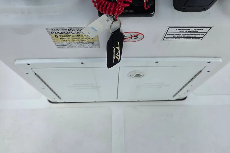 Slide: The Image of 2024 Tidewater 180 CC Adventure boat console with key and capacity label. - 8