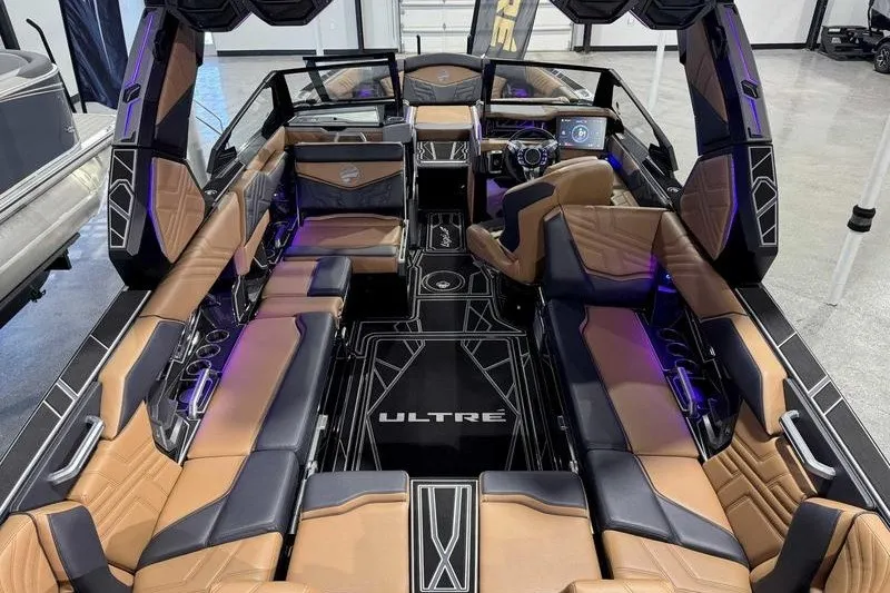 Slide: The Image of Luxurious interior of 2027 Tigé 25ZX boat with modern seating and sleek design. - 9