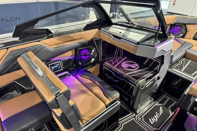 Slide: The Image of Luxurious interior of 2027 Tigé 25ZX boat with modern seating and ambient lighting. - 6