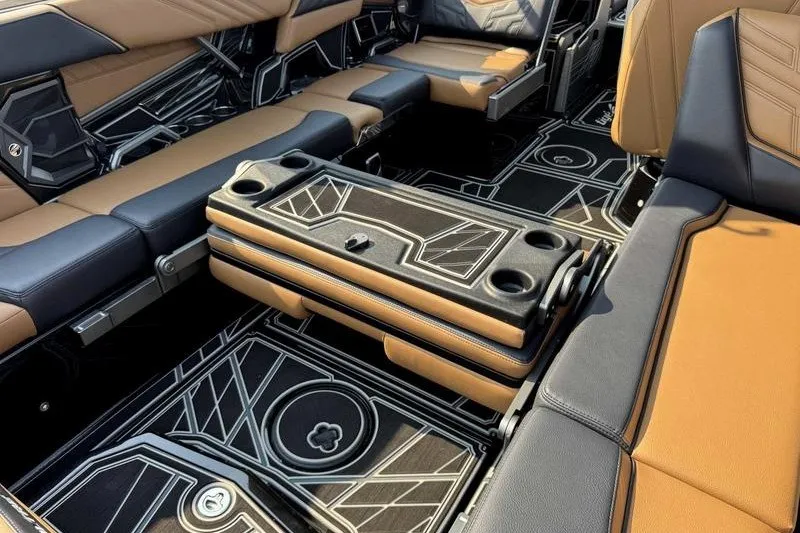 Slide: The Image of Luxurious interior of 2027 Tigé 25ZX boat with stylish seating and modern design. - 2