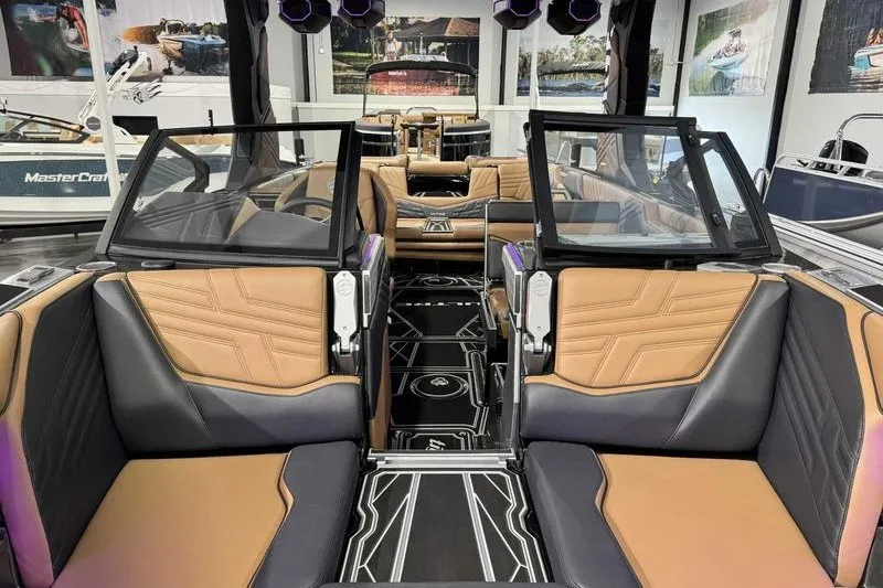 Slide: The Image of Interior of a 2027 Tigé 25ZX boat with luxurious seating and modern design. - 19