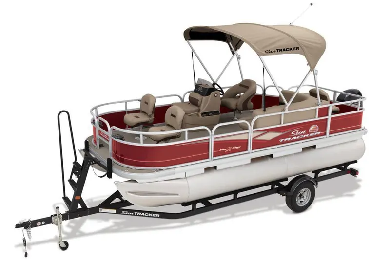 Slide: The Image of 2018 Sun Tracker Bass Buggy 18 DLX pontoon boat with red hull and beige sunshade. - 13