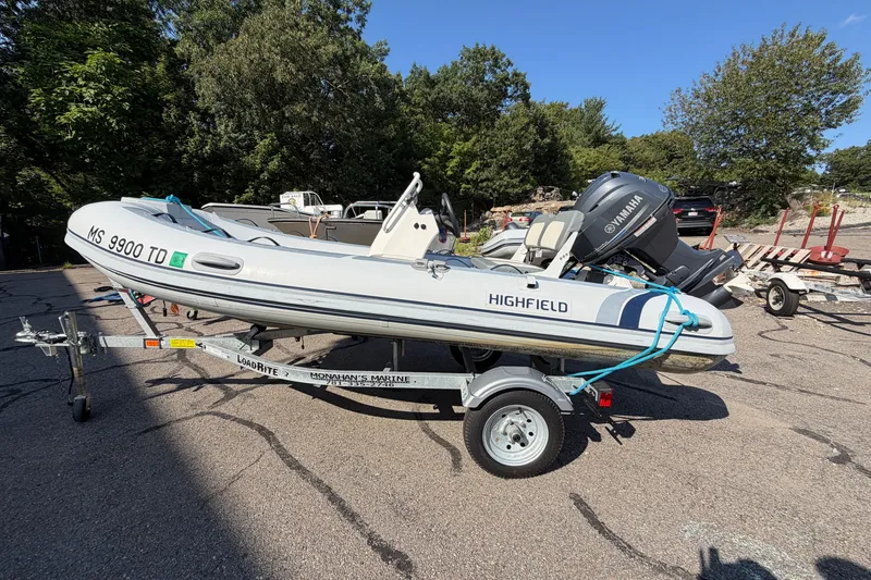 The Image of 2025 Highfield Classic 380 FCT boat on trailer, parked outdoors. - 0
