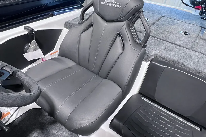 Slide: The Image of 2026 Skeeter ZXR20 SE boat interior with sleek black seating and modern design. - 10