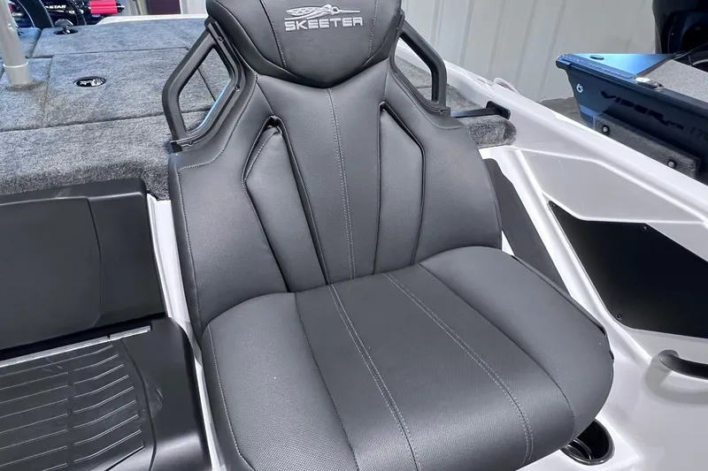 Slide: The Image of 2026 Skeeter ZXR20 SE boat seat, featuring sleek black design and ergonomic comfort. - 9