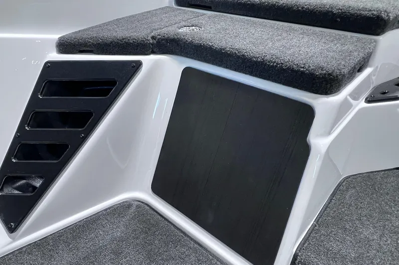 Slide: The Image of Interior view of 2026 Skeeter ZXR20 SE boat with carpeted steps and sleek design. - 17