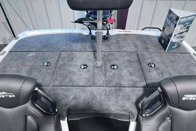 Slide: The Image of 2026 Skeeter ZXR20 SE boat deck with carpeted storage compartments and seating. - 12