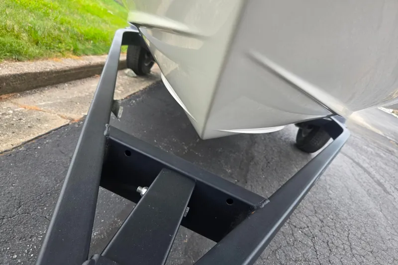 Slide: The Image of 2022 Bayliner VR4 Bowrider I/O on trailer, close-up view of hull and wheels. - 7