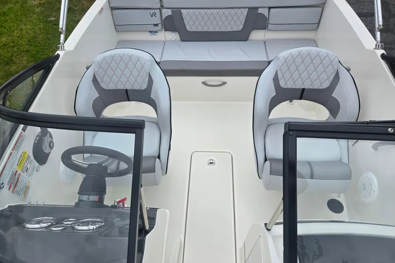 Slide: The Image of 2022 Bayliner VR4 Bowrider I/O interior with stylish seating and modern dashboard design. - 19