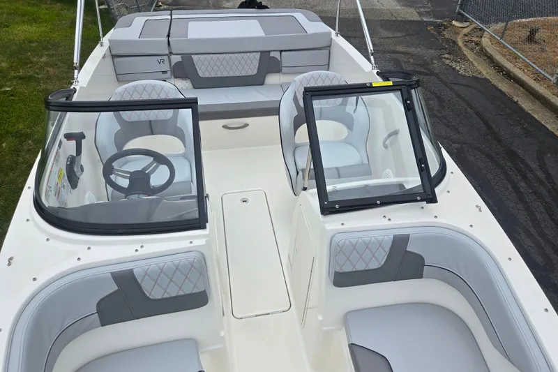 Slide: The Image of 2022 Bayliner VR4 Bowrider I/O with spacious seating and modern design. - 18