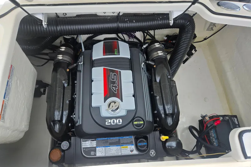 Slide: The Image of 2022 Bayliner VR4 Bowrider I/O engine compartment with 4.5L 200 HP engine. - 22