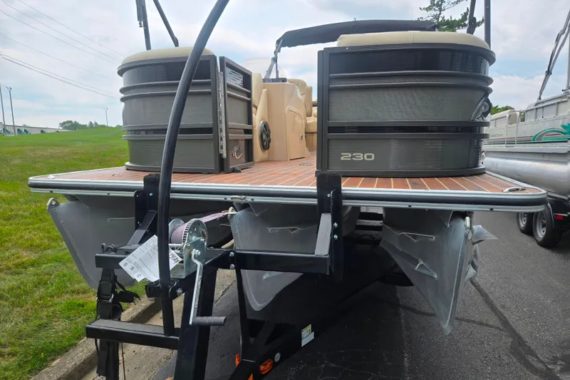 Slide: The Image of 2016 Crest Classic 230 Chateau pontoon boat on trailer, rear view. - 6