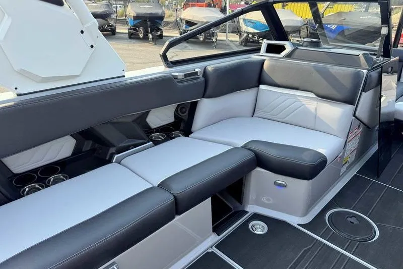 Slide: The Image of Luxurious interior of 2027 Supra R225 boat with sleek seating and modern design. - 15