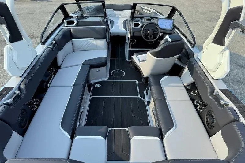 Slide: The Image of Luxurious interior of 2027 Supra R225 boat with modern seating and sleek design. - 4