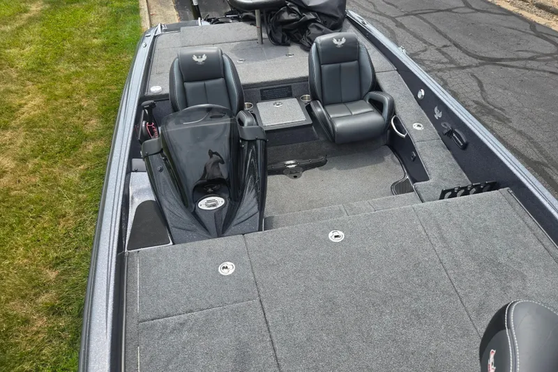 Slide: The Image of 2021 Phoenix 920 Elite boat interior with sleek seating and spacious deck. - 20