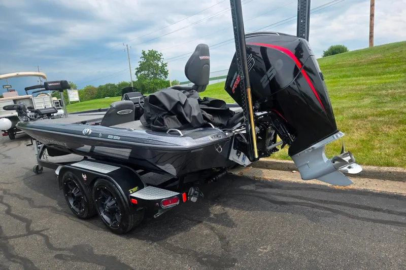 Slide: The Image of 2021 Phoenix 920 Elite boat with powerful outboard motor on a trailer. - 3