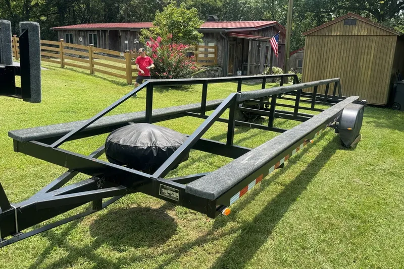 Slide: The Image of Trailer for 2011 Catamaran Cruisers Lil Hobo 31 on grassy yard. - 45