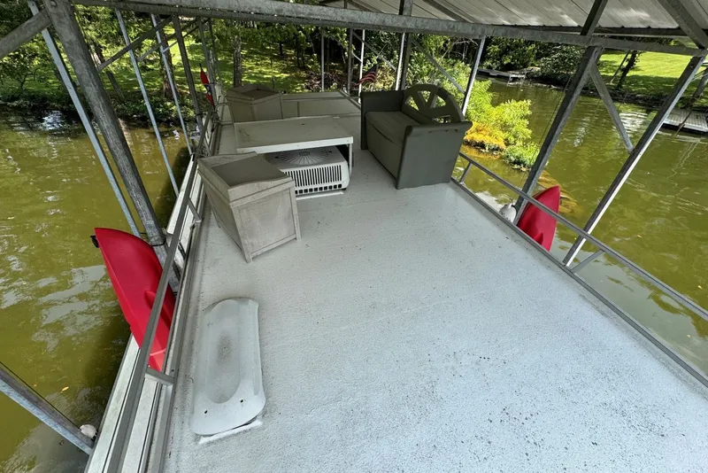 Slide: The Image of Top deck of 2011 Catamaran Cruisers Lil Hobo 31 houseboat with seating and storage. - 40