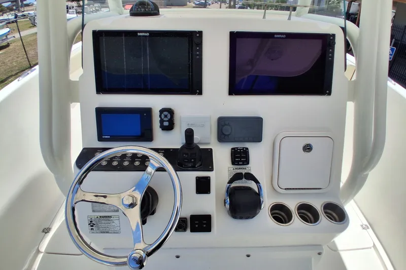 Slide: The Image of Century 3200 Center Console 2020 dashboard with steering wheel and navigation displays. - 24