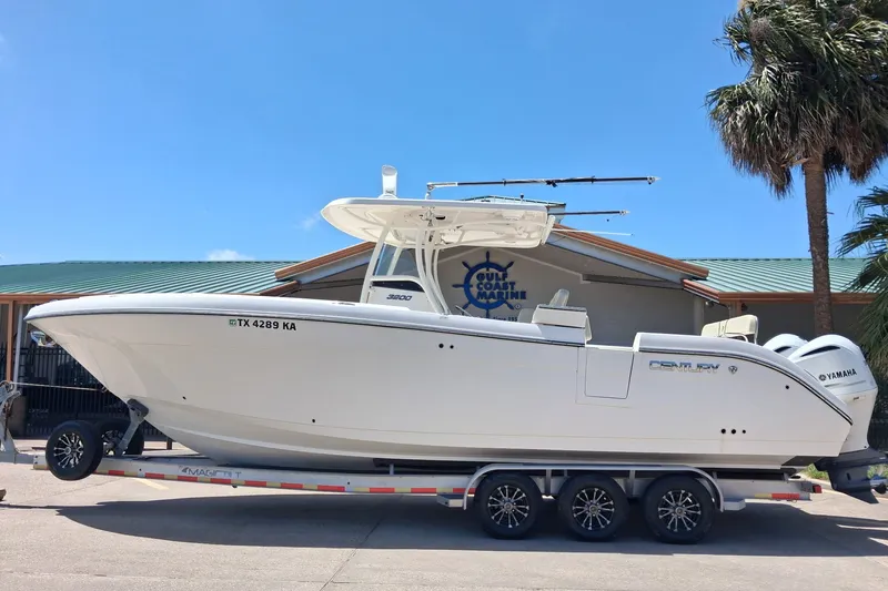 The Image of 2020 Century 3200 Center Console boat on trailer, parked outside Gulf Coast Marine. - 0