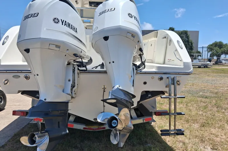 Slide: The Image of Twin Yamaha 300 outboard engines on a 2020 Century 3200 Center Console boat. - 2