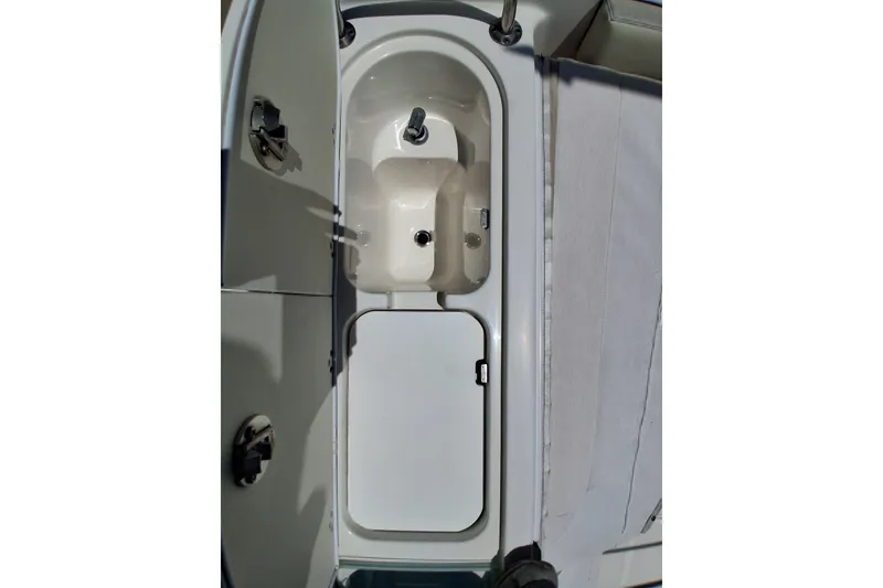Slide: The Image of 2020 Century 3200 Center Console boat sink and storage compartment. - 19