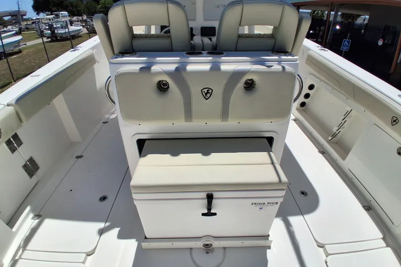 Slide: The Image of 2020 Century 3200 Center Console boat interior with seating and storage compartments. - 27